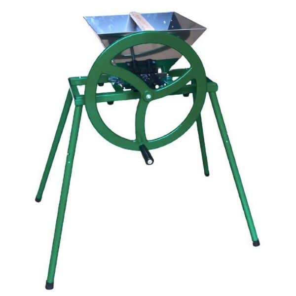 Apple crusher with flywheel on a stand